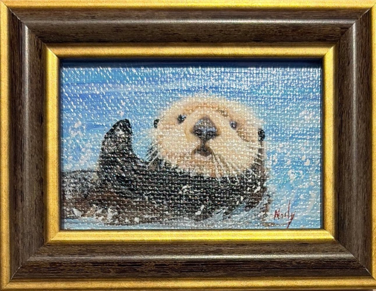 Karen Neely original miniature acrylic painting titled Otter featuring a sea otter floating in sparkling blue water, framed in custom Italian moulding.