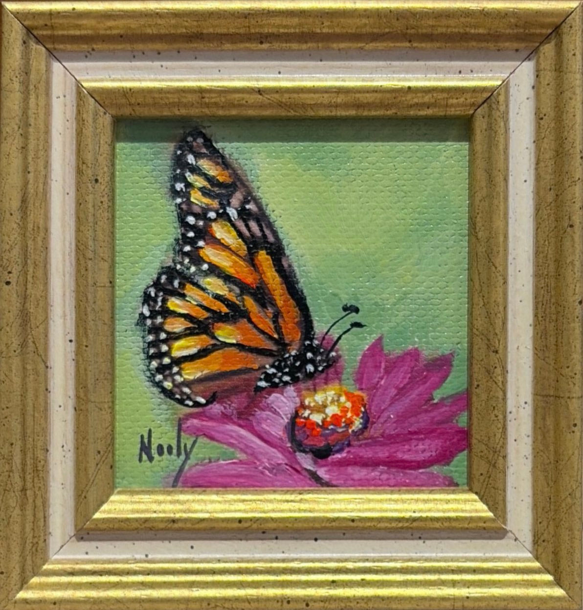 Butterfly original acrylic painting by Karen Neely featuring a monarch butterfly resting on a vibrant pink flower, custom framed in an Italian gold moulding.