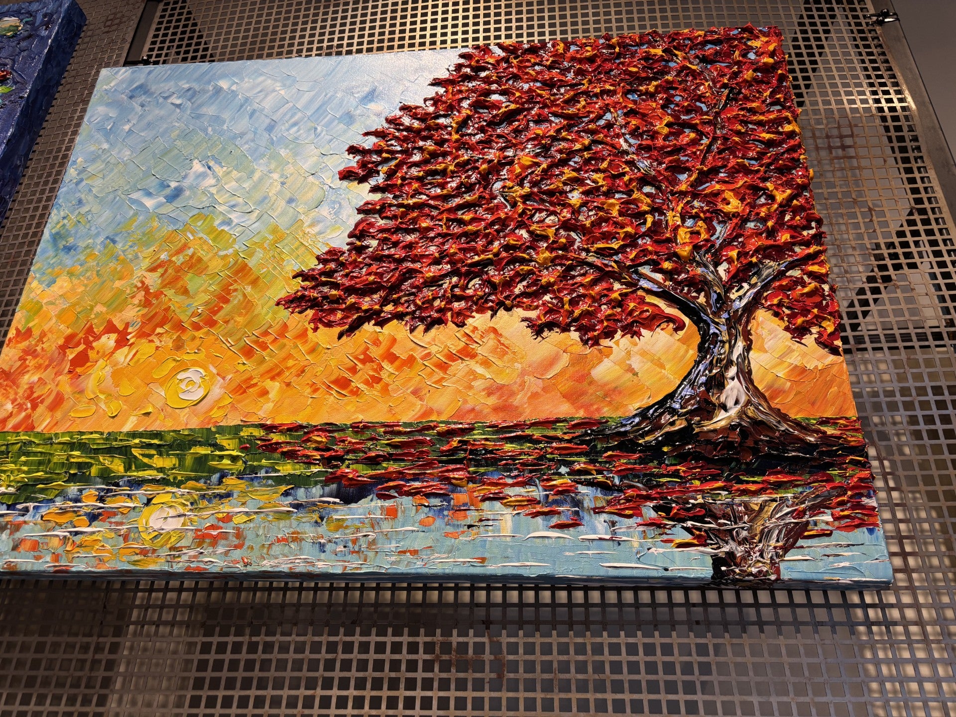 Colorful painting of a tree with autumn foliage painted by French impressionist - Isabelle Dupuy.