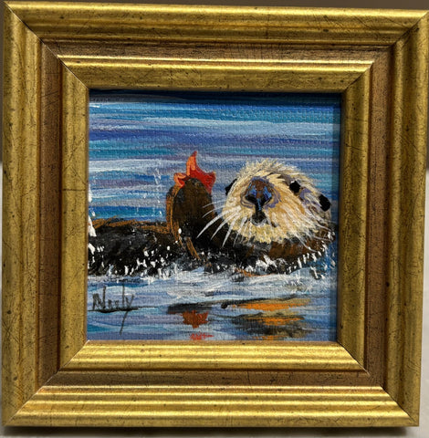 Alt Text: Otter miniature original acrylic painting by Karen Neely (#2M27), otter holding shellfish in paw while floating, framed in imported Italian frame with easel back.