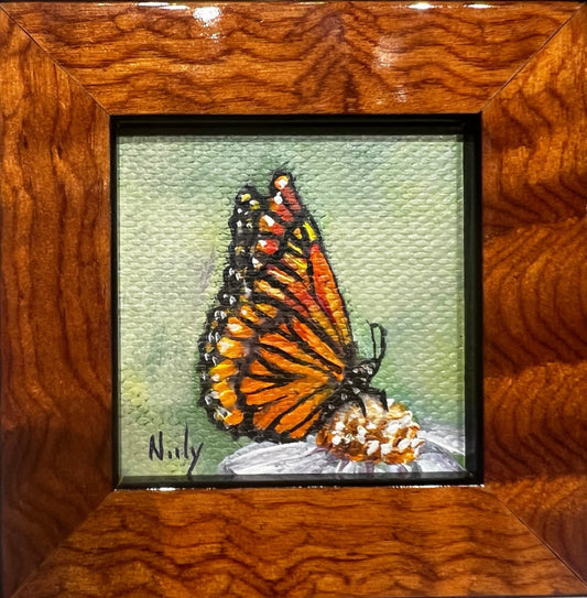 Miniature butterfly painting by Karen Neely in burl wood frame hanging on wine bottle