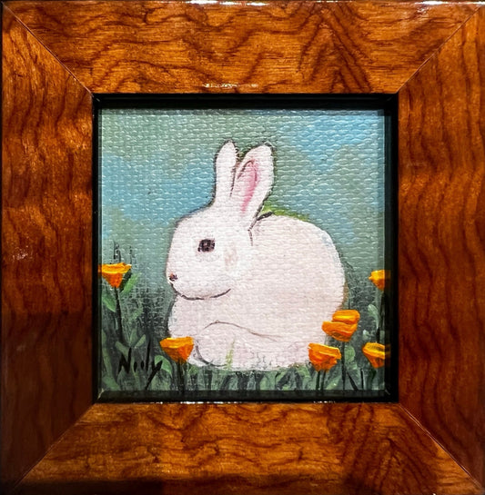 Bunny miniature painting by Karen Neely hanging on wine bottle