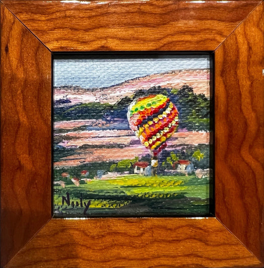 Hot air balloon miniature painting by Karen Neely on wine bottle