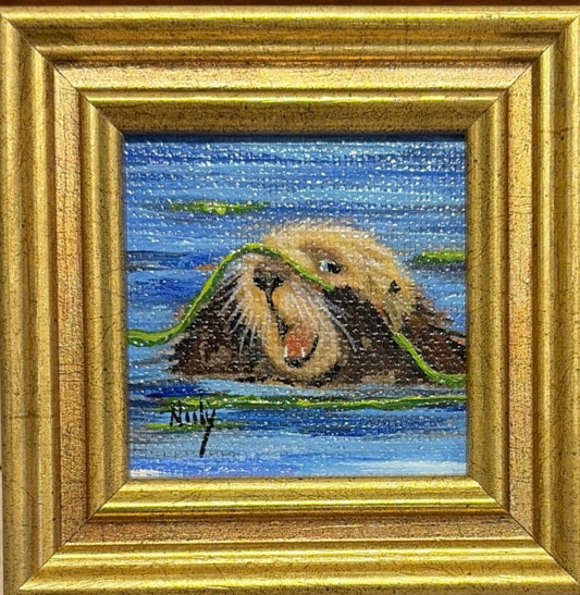 Karen Neely miniature original acrylic painting titled Otter depicting a sea otter floating in blue water with green kelp, framed in a gold custom Italian moulding.
