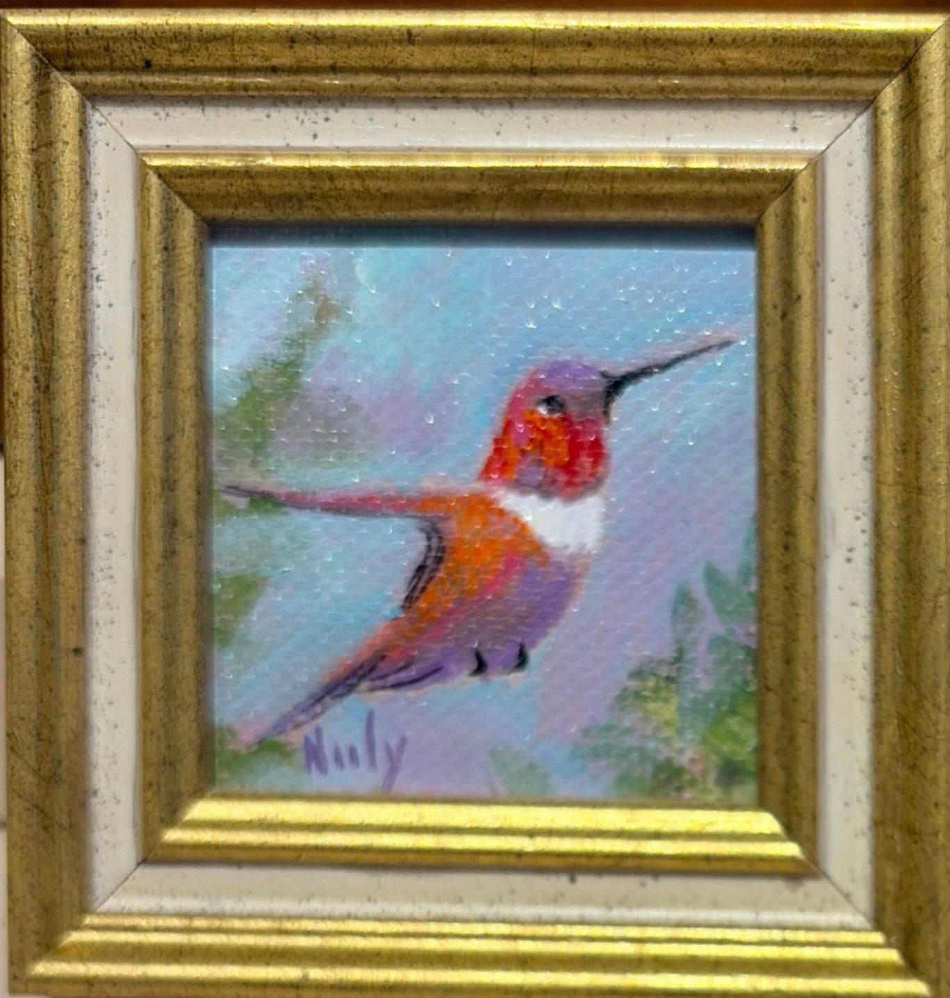 Hummingbird original acrylic painting by Karen Neely featuring a ruby-throated hummingbird in flight, custom framed in an Italian gold moulding.