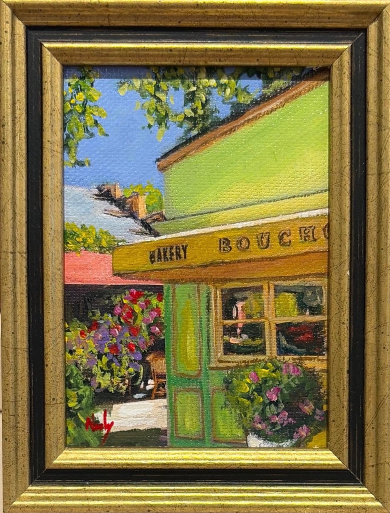Bouchon Bakery original acrylic painting by Karen Neely featuring the iconic Yountville bakery storefront with colorful flowers, custom framed in an Italian gold moulding.