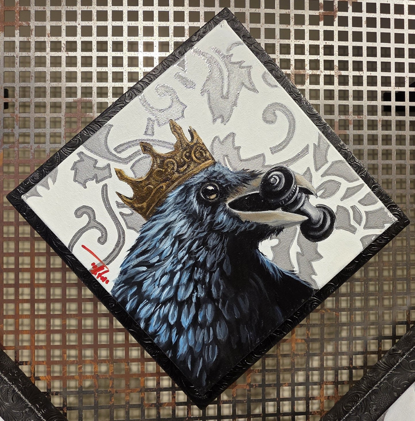 “Checkmate” by Pete Tillack – a raven holding a chess queen, symbolizing strategy and power.