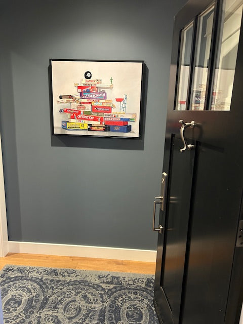 The Games People Play by Gail Chandler in black custom float frame in customers home.