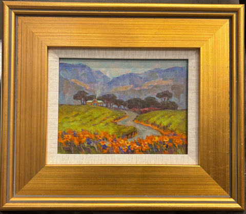 Napa Vineyards original oil painting by Tania Yukhimets featuring vineyard hills, wildflowers, winding stream, and countryside home, framed 14.25x12.25 inches.
