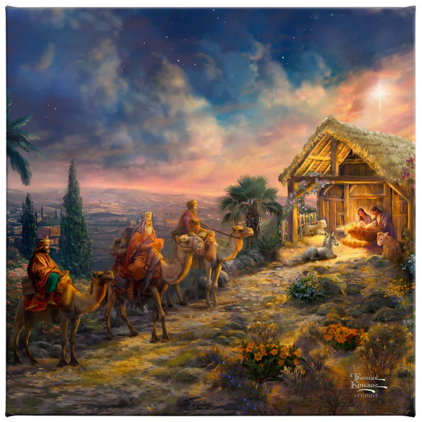 “Away in the Manger by Thomas Kinkade Studios—a glowing Nativity scene with the Three Wisemen arriving at the manger.”