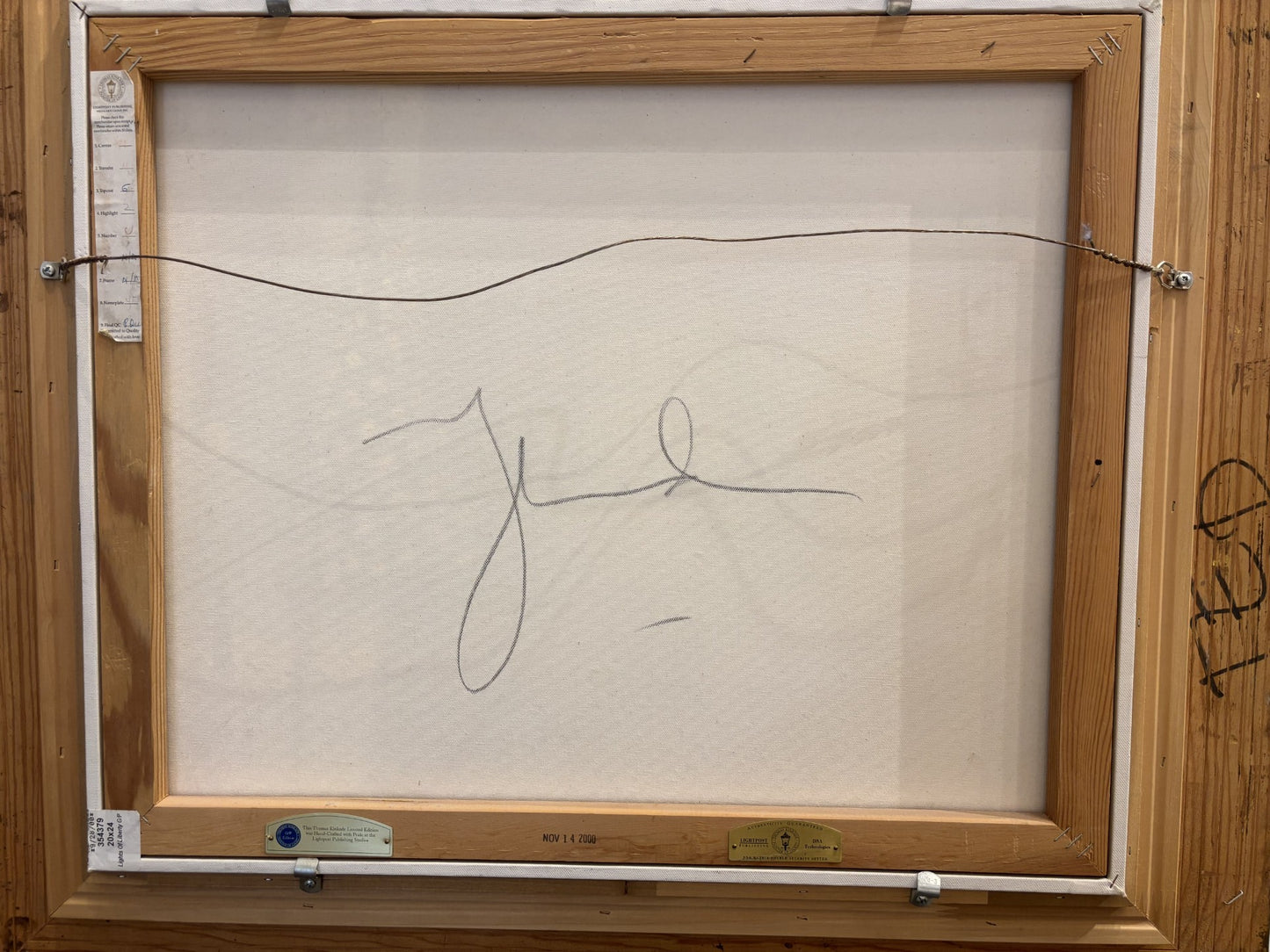 Back of canvas showing rare Thomas Kinkade signature