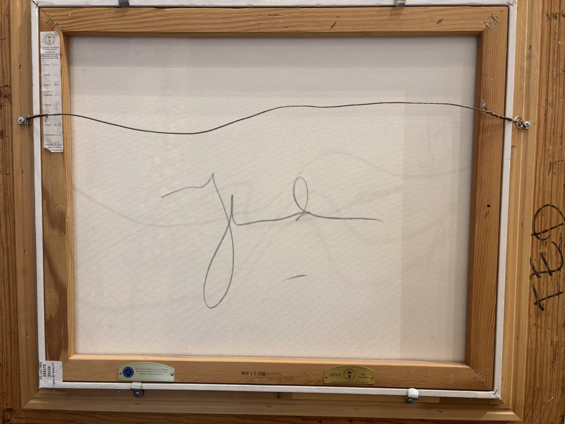 Back of canvas showing rare Thomas Kinkade signature