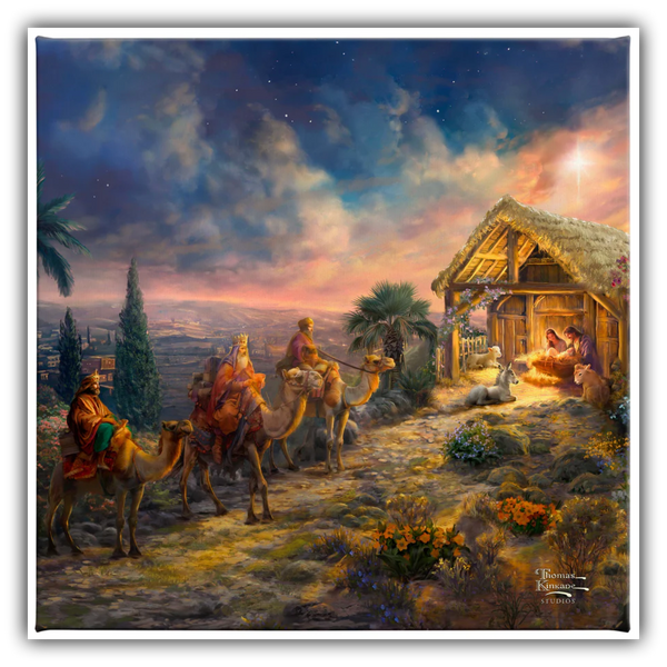“Away in the Manger by Thomas Kinkade Studios—a glowing Nativity scene with the Three Wisemen arriving at the manger.”