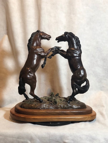 Power Play bronze sculpture